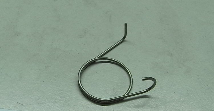 Пружина коромысла выпускного клапана