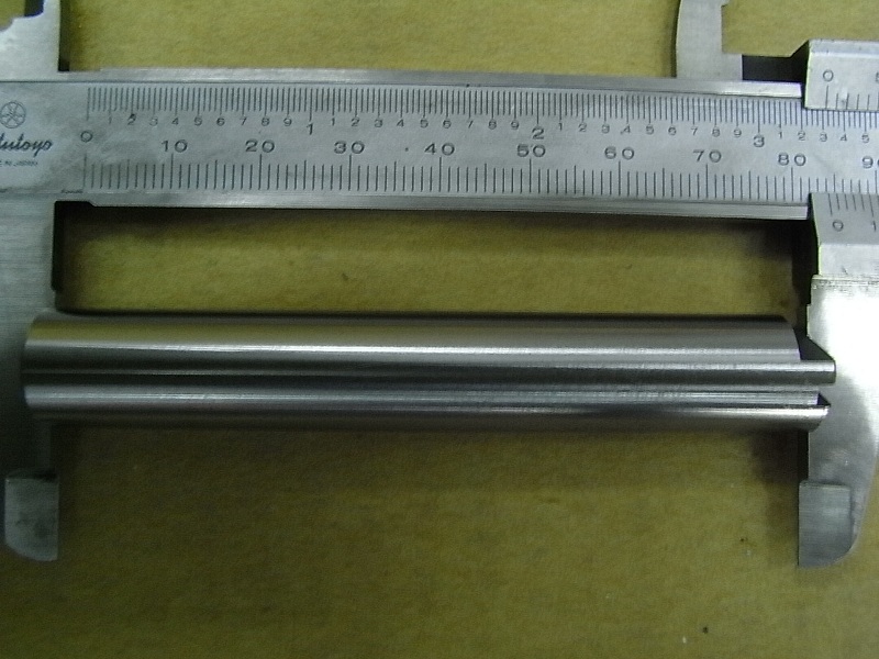 Вал коромысла выпускного клапана