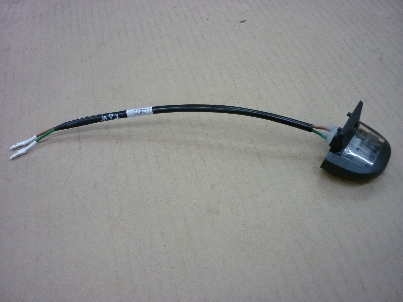 Фонарь освещения номерного знака