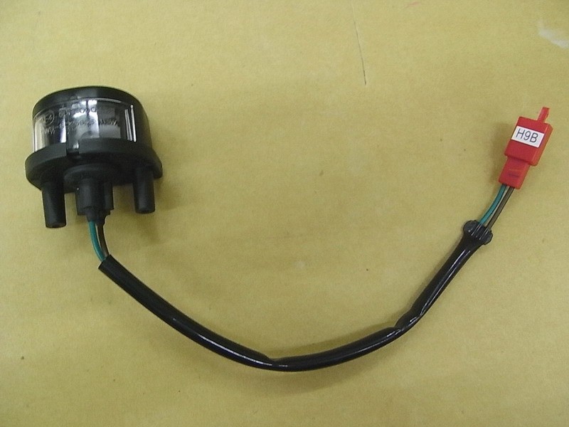 Фонарь освещения номерного знака