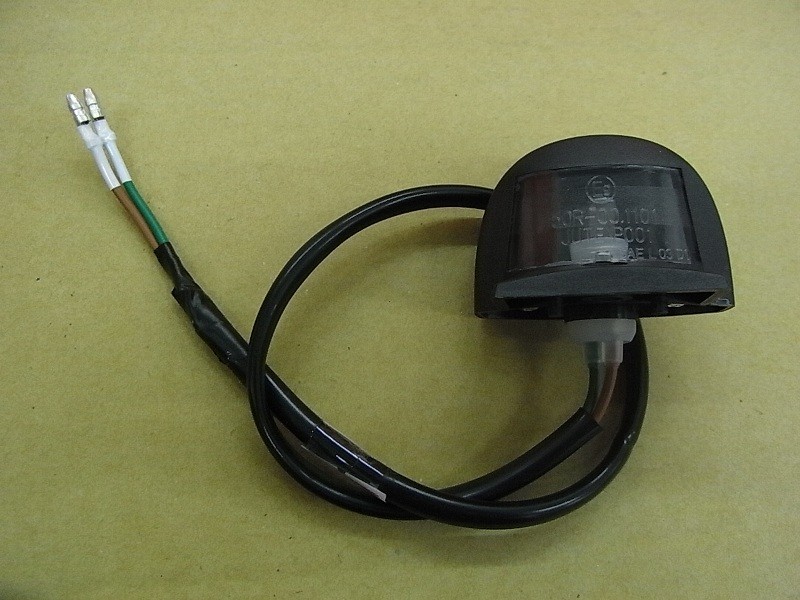 Фонарь освещения номерного знака