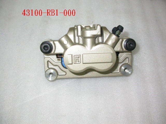 Суппорт заднего дискового тормоза