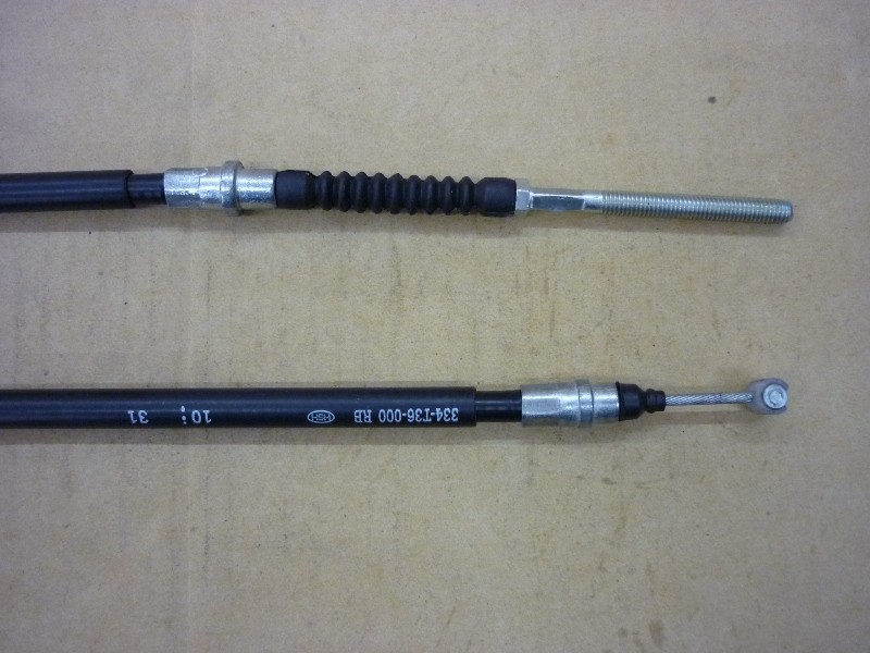 Трос заднего тормоза