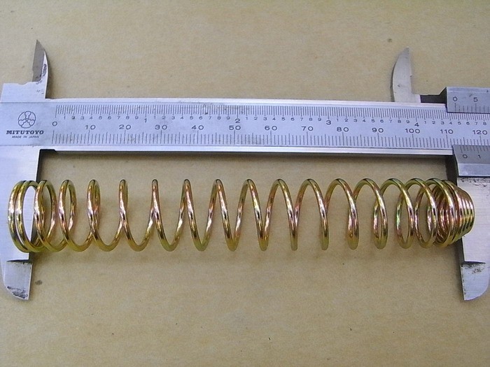 Пружина рычага эксцентрика заднего тормоза