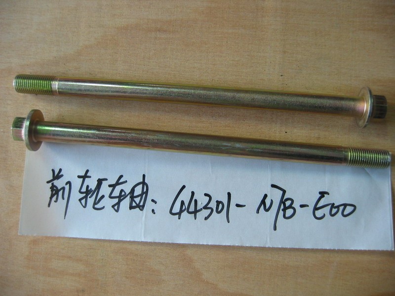 Ось колеса переднего