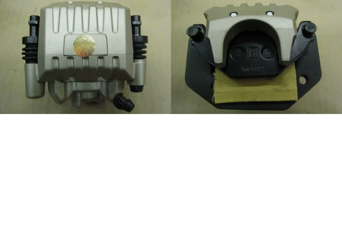 Суппорт тормозной передний правый с колодками