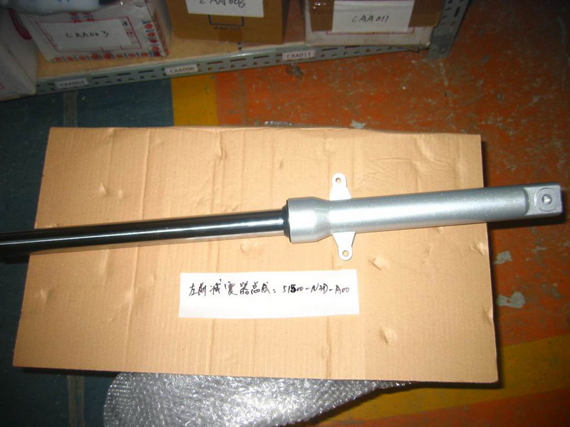 Амортизатор передний левый