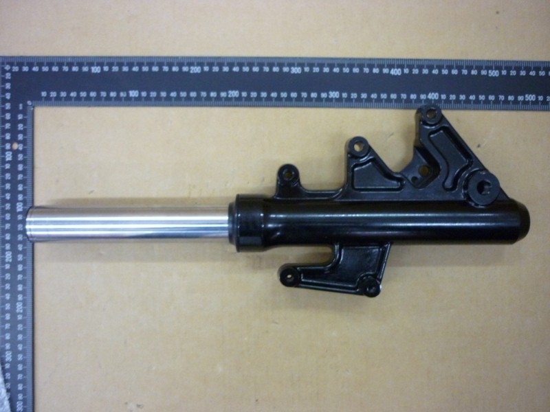 Амортизатор передний левый