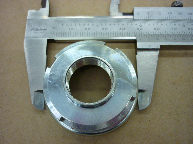 Гайка верхняя рулевой колонки